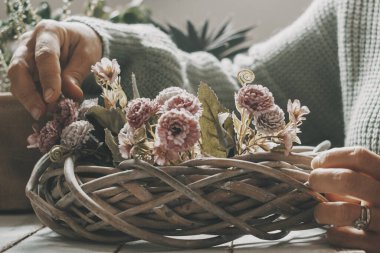 Close up view of woman enjoying time with gardening indoor leisure activity at home. Green color and mood mage of people working indoor. Relaxation and nature composition people. Alone lady lifestyle