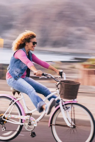 Blurred Motion Picture Cheerful Joyful Young Woman Enjoying Bike Ride — Stock Photo, Image