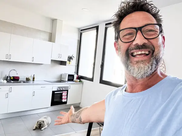 Man Dow Owner Take Selfie Picture Indoor House Showing Kitchen Stock Photo