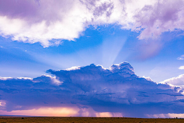 storm clouds in the sky over the prairie.