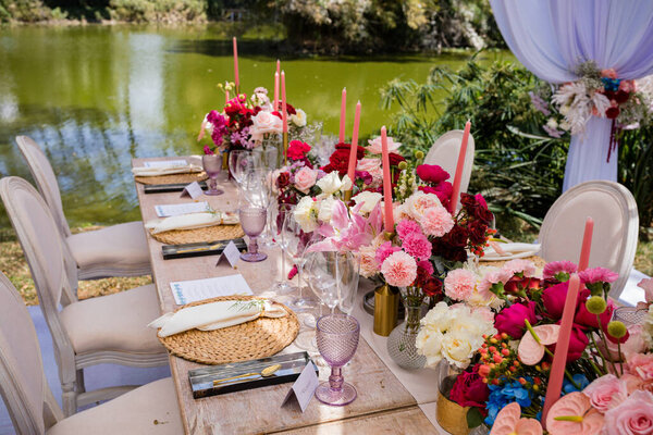 wedding table setting with flowers and decorations