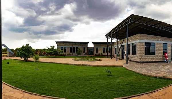 Parçalayıcı binalar çadır dekorasyonları Kenya Doğu Afrika 'nın dış yüzeyi taştan.