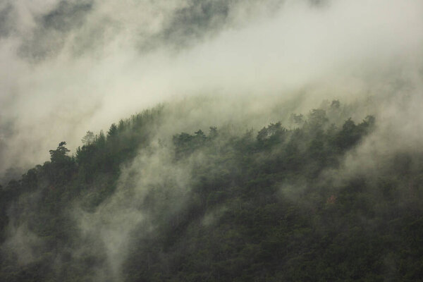 Mountain landscape. rain clouds over the forest. Turkey.