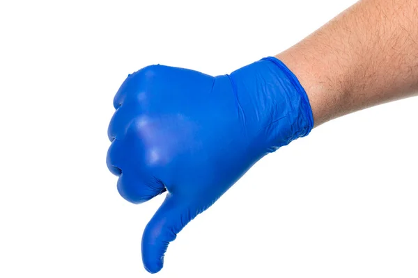 作物のサイドビュー医師の匿名の手で保護青手袋示す親指ダウン上の白の背景に隔離 — ストック写真