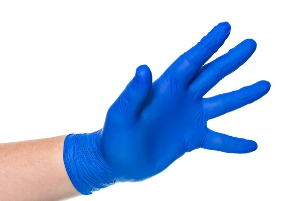 Рука Анонимного Человека Синей Латексной Перчатке Тянется Белом Фоне — стоковое фото