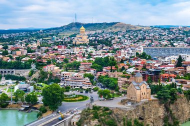 Old Tbilisi with Sameba Cathedral, Europe square and Metekhi church on bank of Kura river. Tiflis old town is popular tourist destination in Georgia.