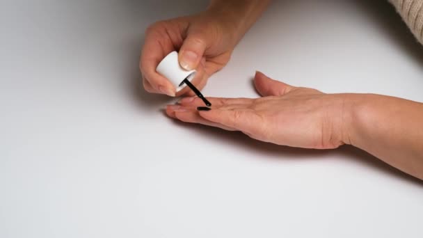 Close Woman Painting Nails Black Nail Polish Self Made Manicure — Stok video