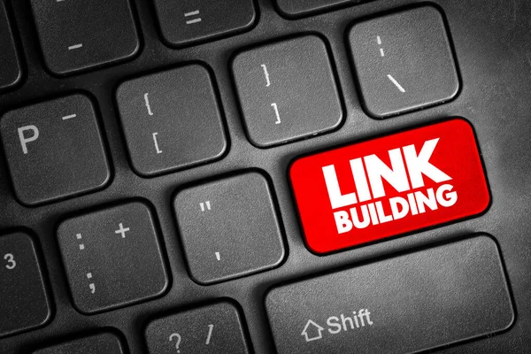 stock image Link building - practice of building one-way hyperlinks to a website with the goal of improving search engine visibility, text button on keyboard