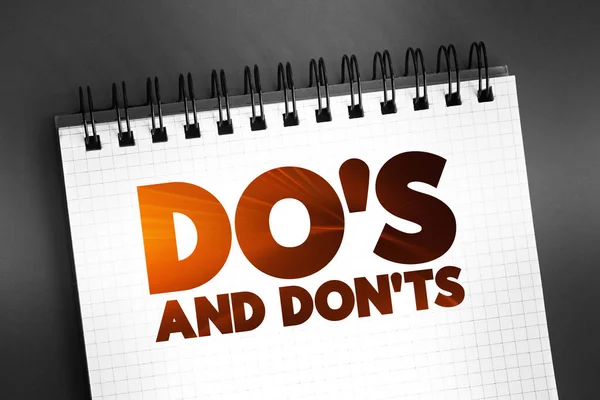 Do\'s And Don\'ts text quote on notepad, concept background