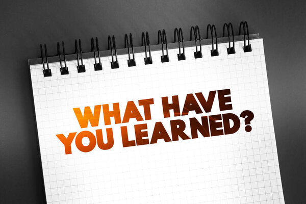 What Have You Learned question text quote on notepad, concept background