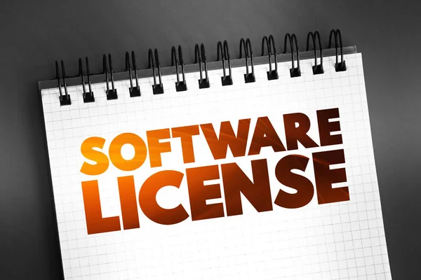 Software License - legal instrument governing the use or redistribution of software, text on notepad