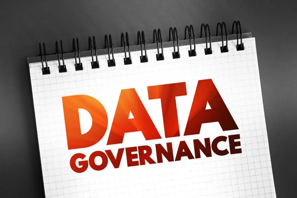 Data governance - collection of processes, roles, policies, standards, and metrics that ensure to achieve its goals, text on notepad concept for presentations and reports