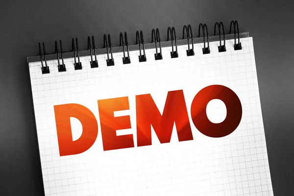 Demo - demonstration of a product or technique, text on notepad concept background