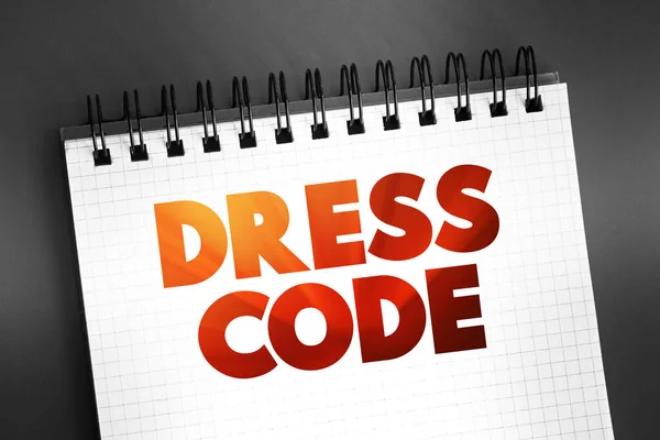 stock image Dress code - set of rules with regards to what clothing groups of people must wear, text  on notepad, concept background