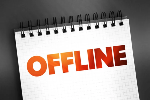 Offline - means that the device and its user are disconnected from the global internet, text on notepad, concept background