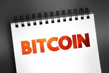 Bitcoin - merkezi dijital para birimi, bir merkez bankası veya tek yönetici olmadan, not defteri üzerine metin, konsept arkaplan