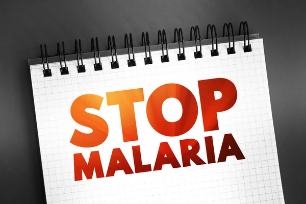 stock image Stop Malaria text on notepad, medical concept background