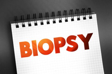 Biyopsi - bir hastalığın varlığını veya kapsamını belirlemek için örnek hücrelerin çıkarılması, not defterindeki metin kavramı