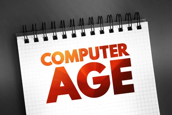 Computer age - period in history characterized by computer use and development and its effects on all aspects of life, text concept on notepad