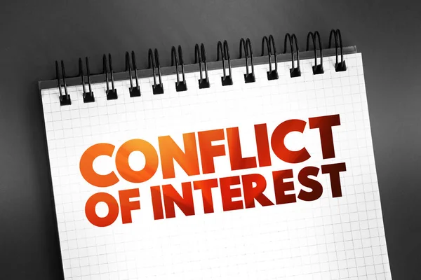 Conflict of interest - situation in which a person or organization is involved in multiple interests and serving one interest could involve working against another, text concept on notepad