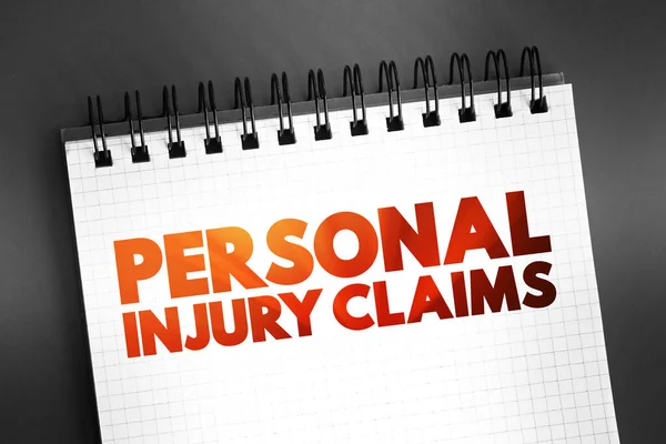 Personal Injury Claims -  legal case you can open if you\'ve been hurt in an accident, text on notepad