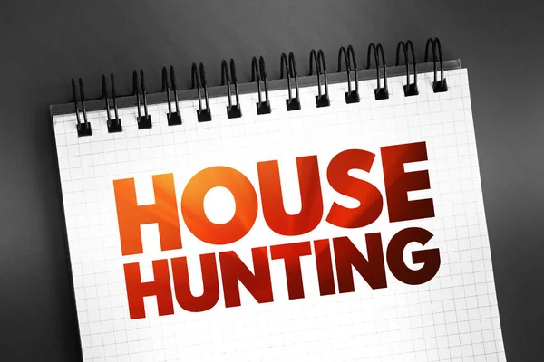 House Hunting - seek a house to buy or rent and live in, text concept on notepad