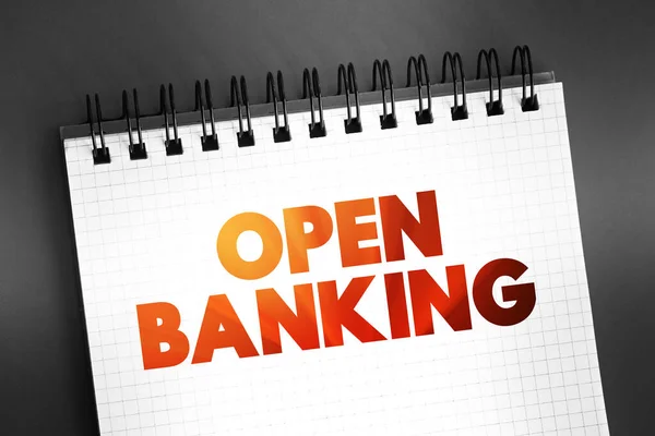 Open Banking - financial technology that enable third-party developers to build applications and services around the financial institution, text concept on notepad