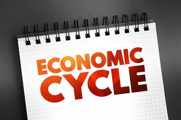 Economic Cycle - overall state of the economy as it goes through four stages in a cyclical pattern, text concept on notepad