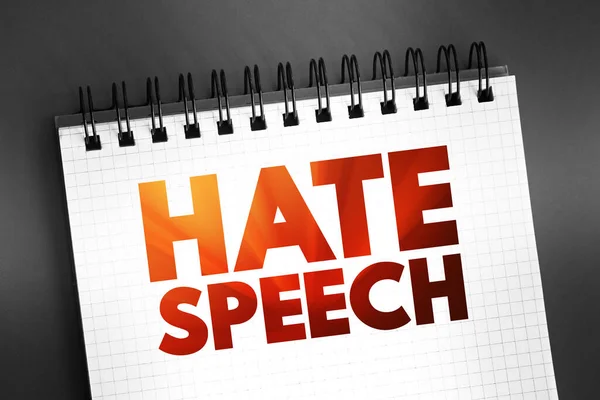 Hate Speech - public speech that expresses hate or encourages violence, text on notepad, concept for presentations and reports