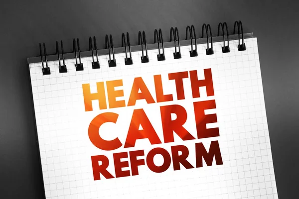 Health care reform - governmental policy that affects health care delivery in a given place, text concept on notepad