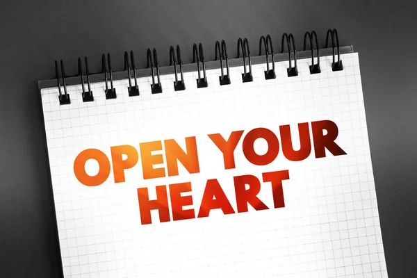 stock image Open your heart text on notepad, concept background