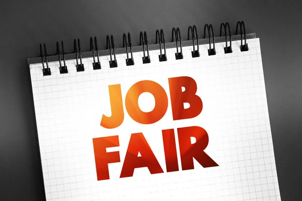 Job Fair - event in which employers, recruiters, and schools give information to potential employees, text on notepad, concept background