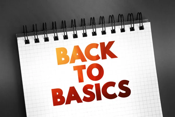 Back to Basics - return to a simpler way of doing something or thinking about something, text concept on notepad