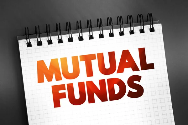 Mutual Funds - professionally managed investment fund that pools money from many investors to purchase securities, text on notepad, concept background