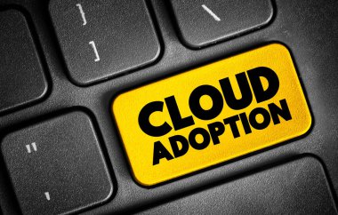 Cloud Adoption is a strategic move by organisations of reducing cost, mitigating risk and achieving scalability of data base capabilities, text concept on keyboard