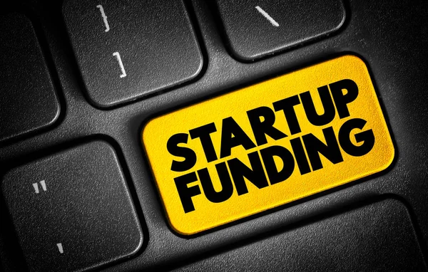 stock image Startup Funding - act of raising capital to support a business venture, text concept button on keyboard