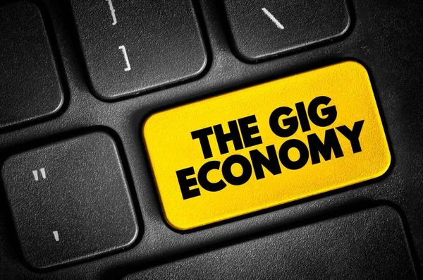 The Gig Economy text button on keyboard, concept background