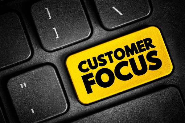 Customer Focus - strategy that puts customers at the center of business decision-making, text concept button on keyboard