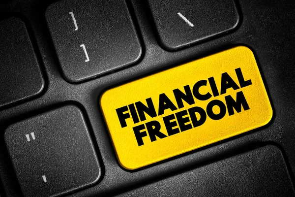 Financial freedom - having enough savings, financial investments, and cash on hand to afford the kind of life we desire for our families, text button on keyboard