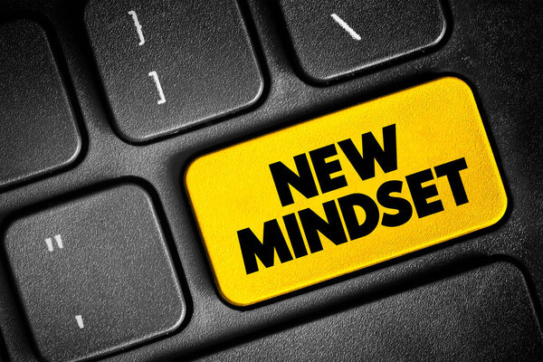 New Mindset text button on keyboard, concept background