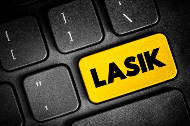 LASIK genellikle lazer göz ameliyatı veya lazer görme düzeltmesi olarak adlandırılır, klavyede metin tuşu, konsept arkaplan