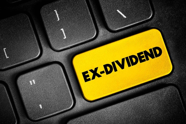 stock image Ex-dividend - stock that is trading without the value of the next dividend payment, text button on keyboard, concept background