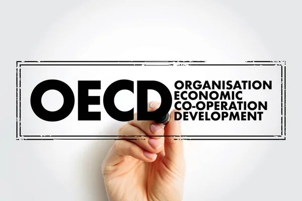 OECD Organisation for Economic Co-operation and Development - global policy forum that promotes policies to improve the economic and social well-being of people, acronym text concept stamp