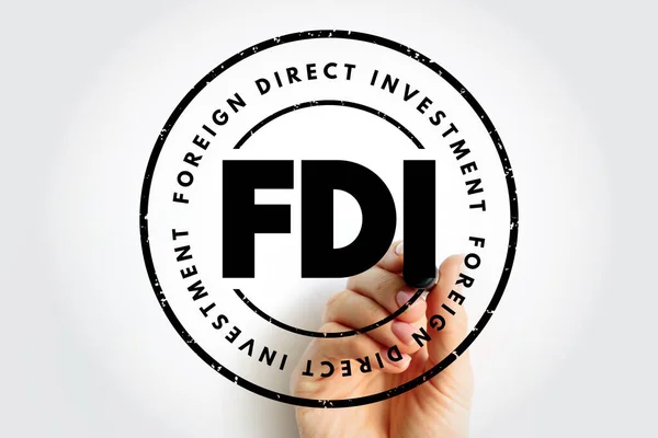 FDI Foreign Direct Investment is an investment in the form of a controlling ownership in a business in one country by an entity based in another country, acronym text stamp