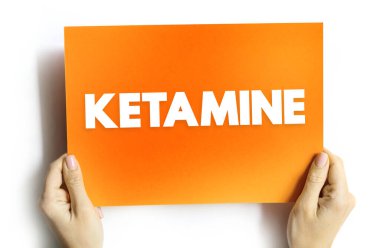 Ketamine is a dissociative anesthetic used medically for induction and maintenance of anesthesia, text concept on card clipart