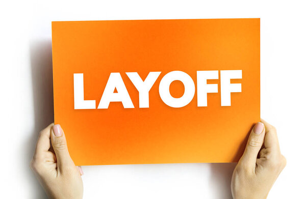 Layoff is the temporary suspension or permanent termination of employment of an employee, text concept on card