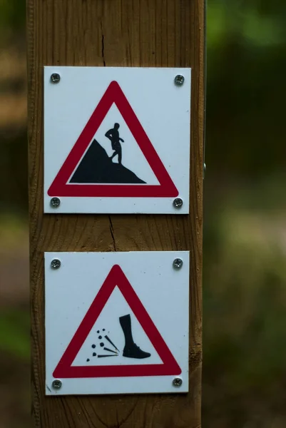 Danger signs in hiking, IMBA approval danger steep descent, loose stone, warning