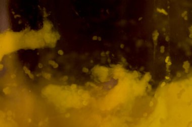 Soğuk siyah arkaplan nedeniyle katı zemin ile saf zeytin yağı dokusu