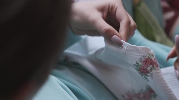 Young Woman Sews Manually Thread Needle Slow Motion Woman Casual — Video