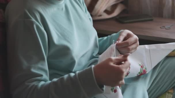 Young Woman Sews While Sitting Home Clothes Cozy Sofa Beautiful — Vídeos de Stock